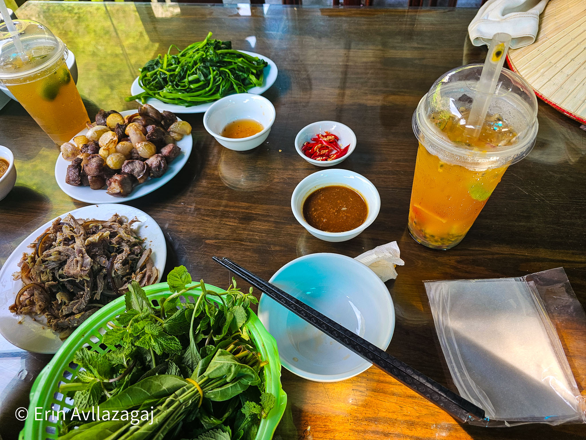Photo of the goat meat, the sides and the teas.